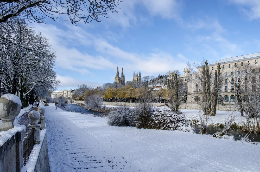 Winter scene of a snowed cityscape landscape of the center historic of city of Burgos , Spain
