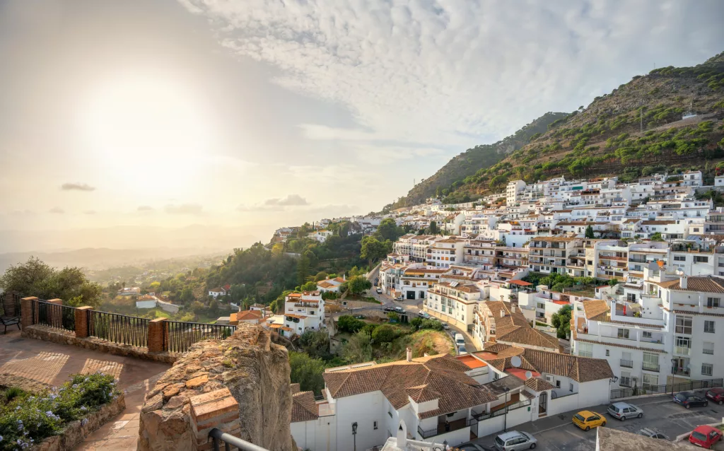 Panoramic view from the fortress wall of Mijas village at sunset. Costa del Sol, Andalusia, Spain