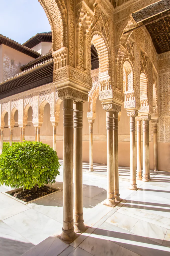 Beautiful arches in arabic style in courtyard of the Lions in the Alhambra Granada, Andalucia, Spain