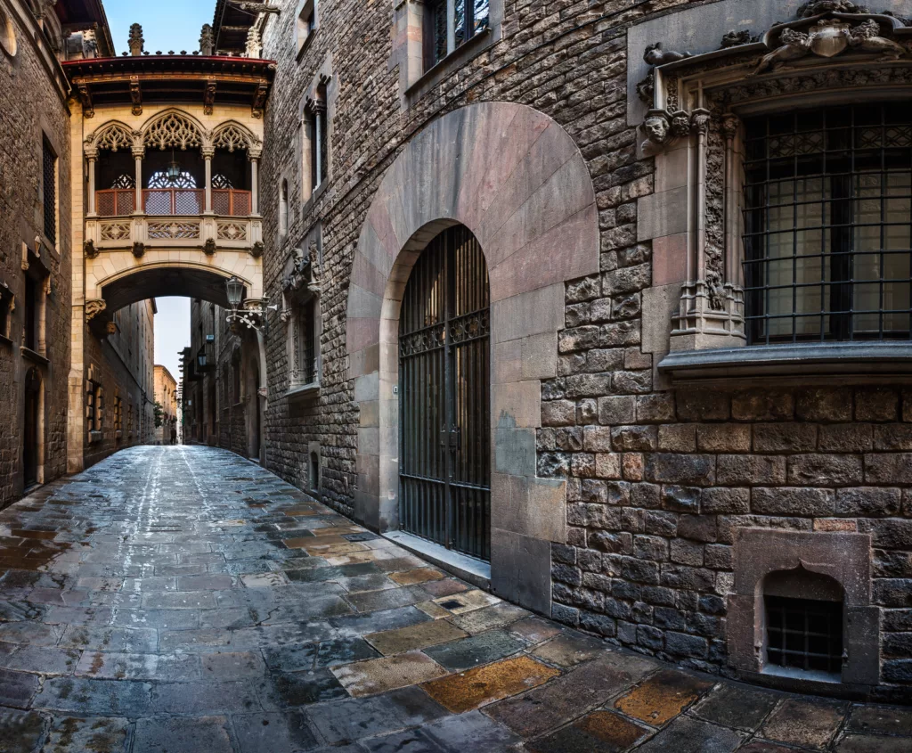 The Barri Gòtic (Gothic Quarter) and the Bridge of Sighs are popular attractions in Barcelona, Catalonia.