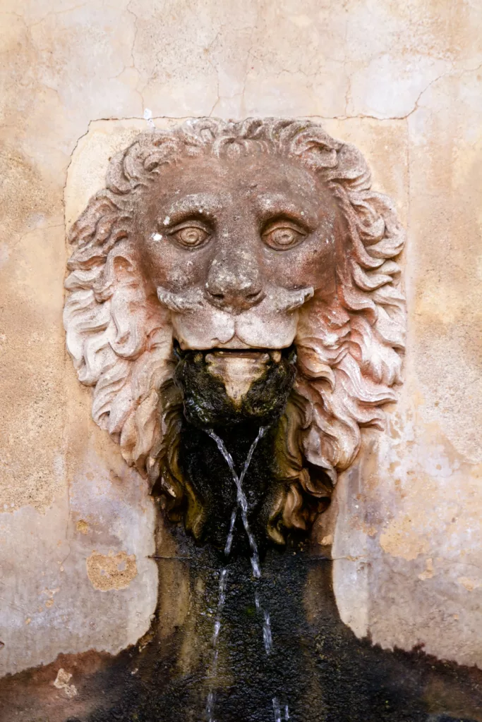 Lion stone sculpture fountain at Son Marroig in Deia.