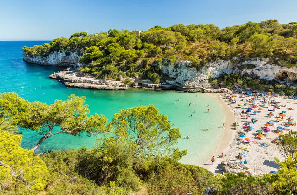 Cala Llombards. Beautiful sandy beach that is sheltered on either side by cliffs. Mallorca island, Spain.