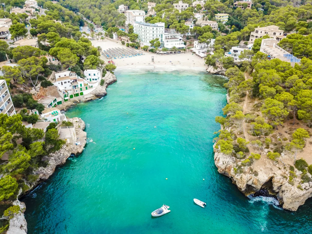 Panoramic shot with drone from above the bay of Cala Santany in Mallorca Spain