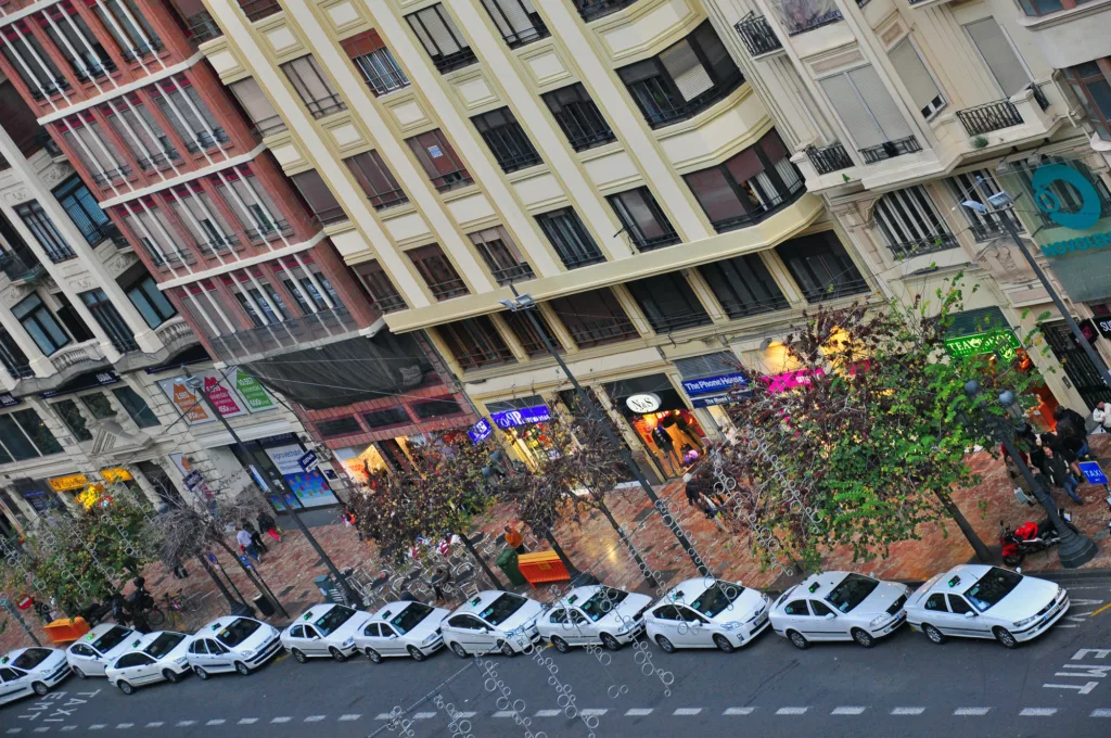 Taxi drivers waits for passengers on the main city square of Valencia