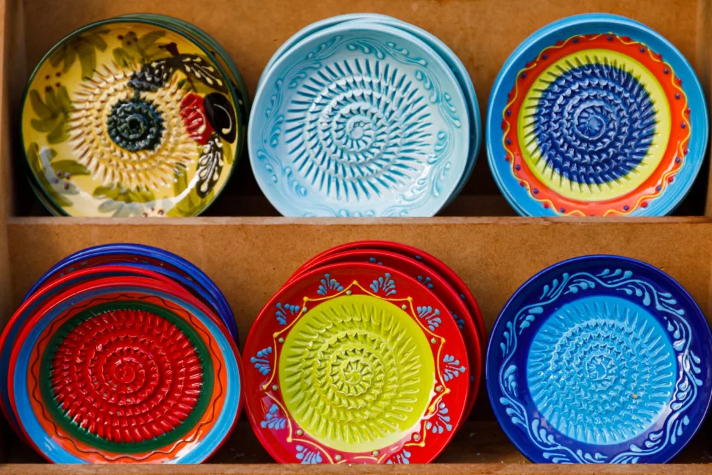 Typical spanish multi-colored plates at the market in Santanyi