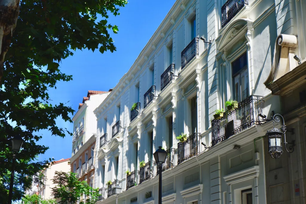 Classical facade of bright pastel colours in Chueca district