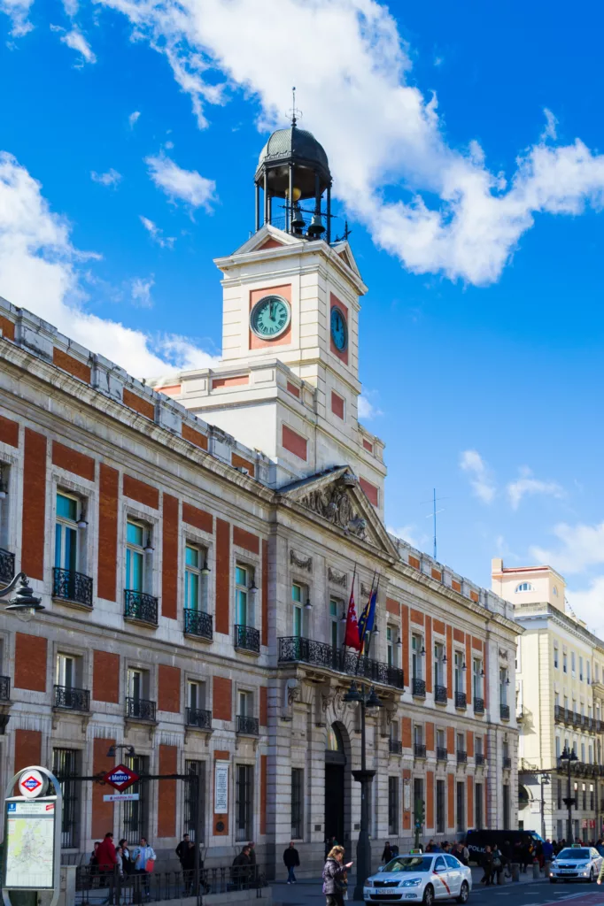 House of the Post Office on the Puerta del Sol, Madrid, Spain. Puerta del Sol is the centre (Km 0) of the radial network of Spanish roads.