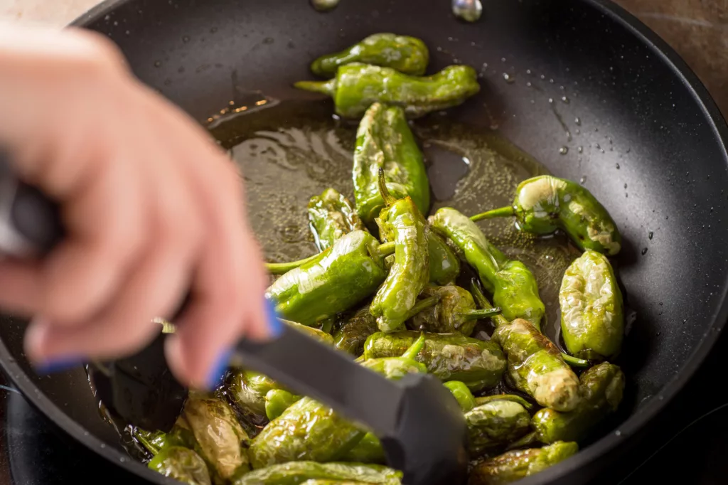 Preparing Green Padron Peppers in the Fryi