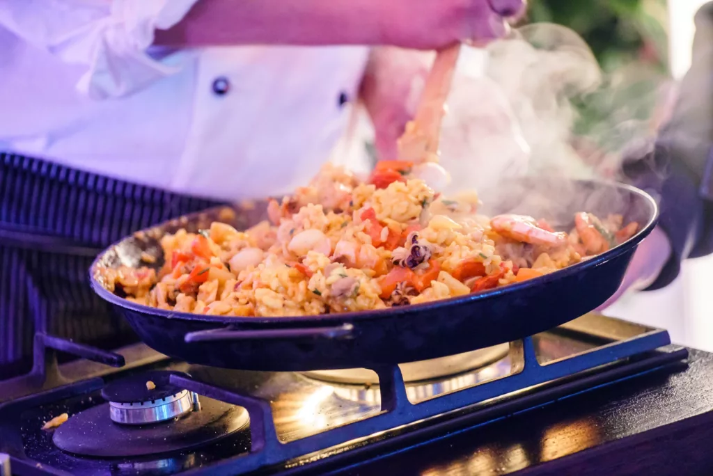 Spanish Chef preparing Paella in January