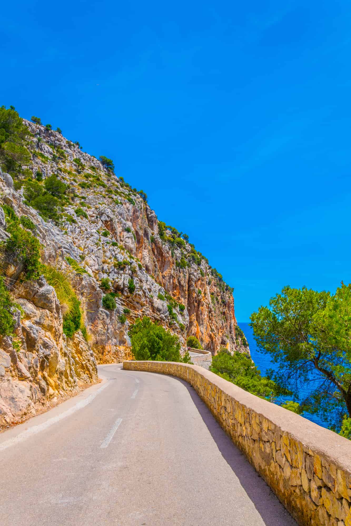 A coastal road winding through Spain