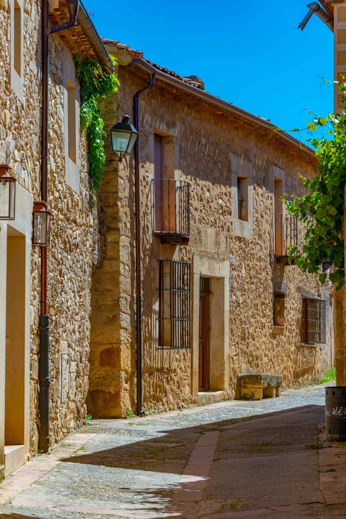 Narrow street in medieval village Pedraza in Spain