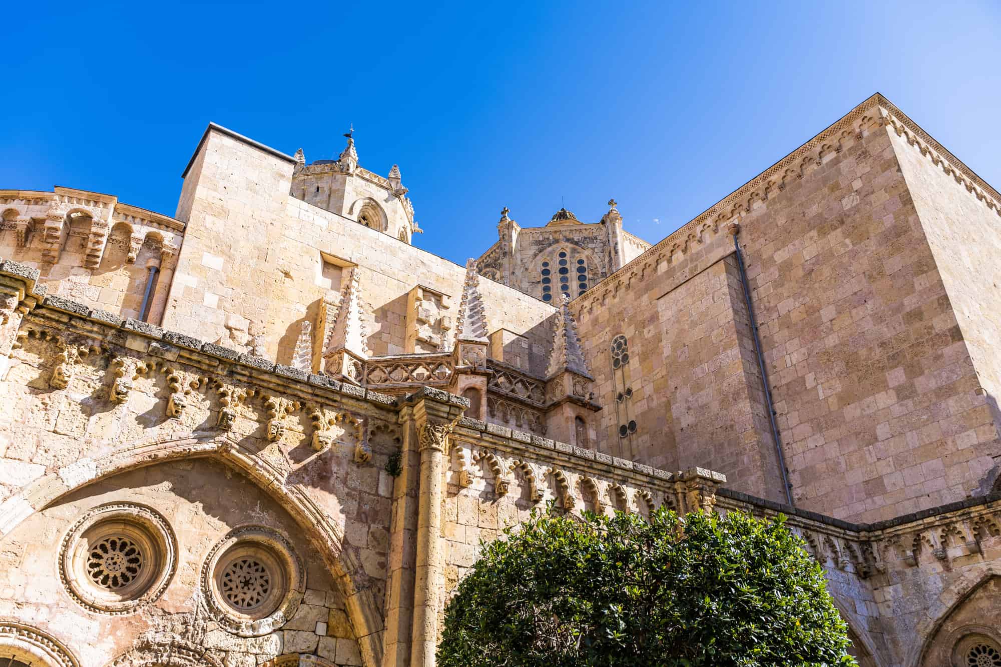 View of the walls from the inner courtyard of the cathedral santa maria of tarragona spain