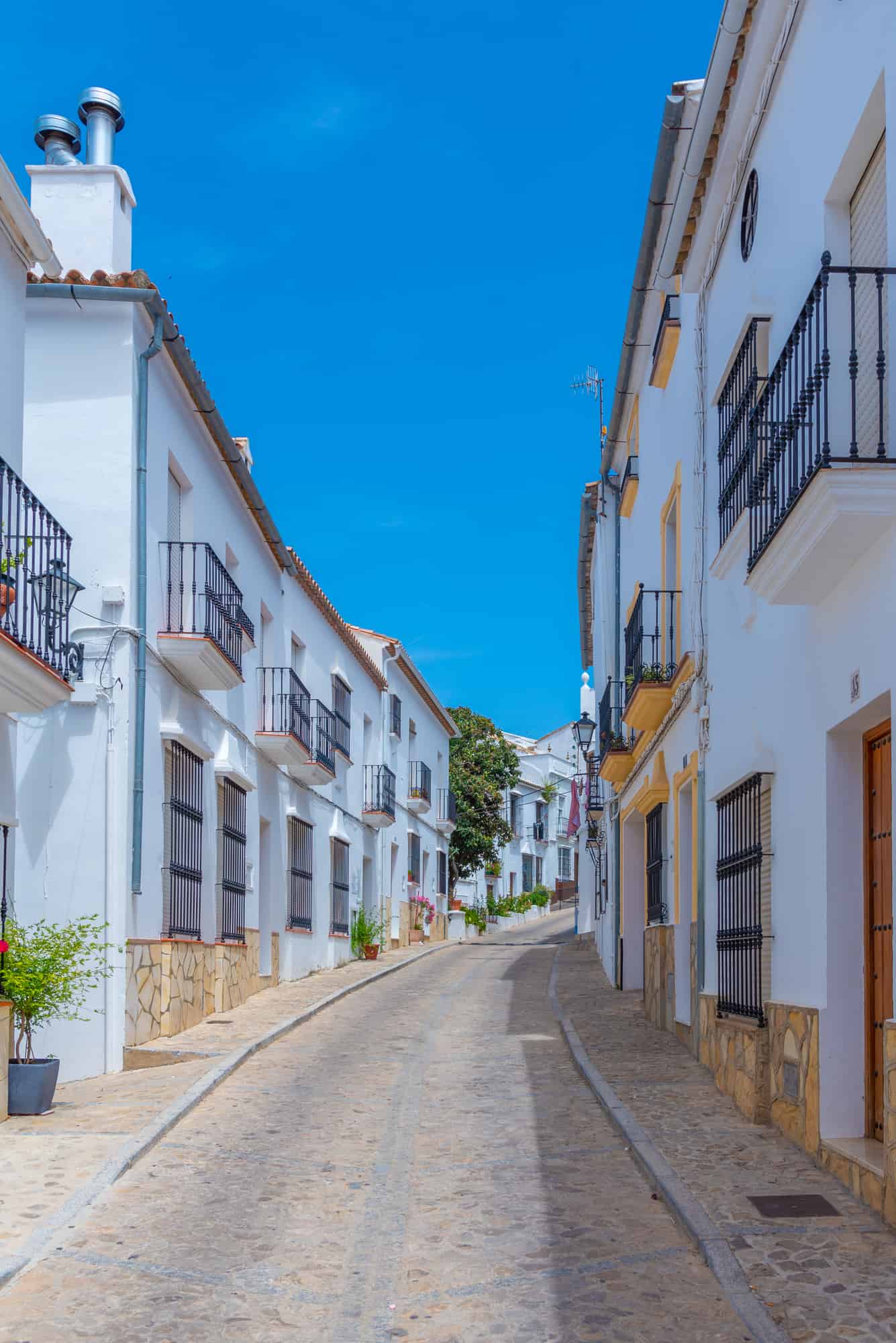 White street in the old town of Spanish city Zahara...