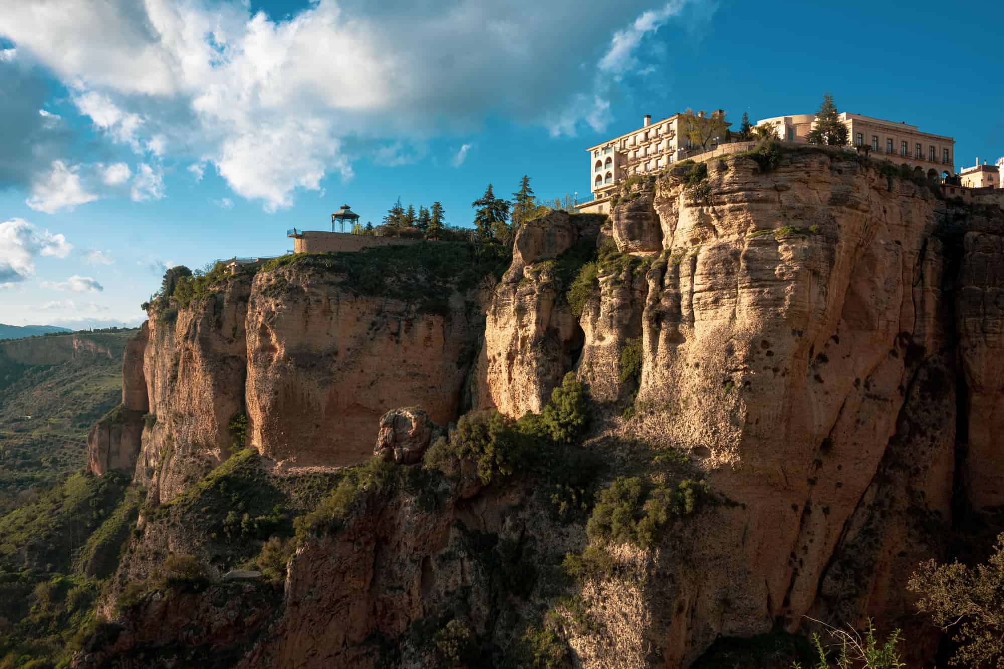 Buildings on huge cliffs in Ronda, Spain in March