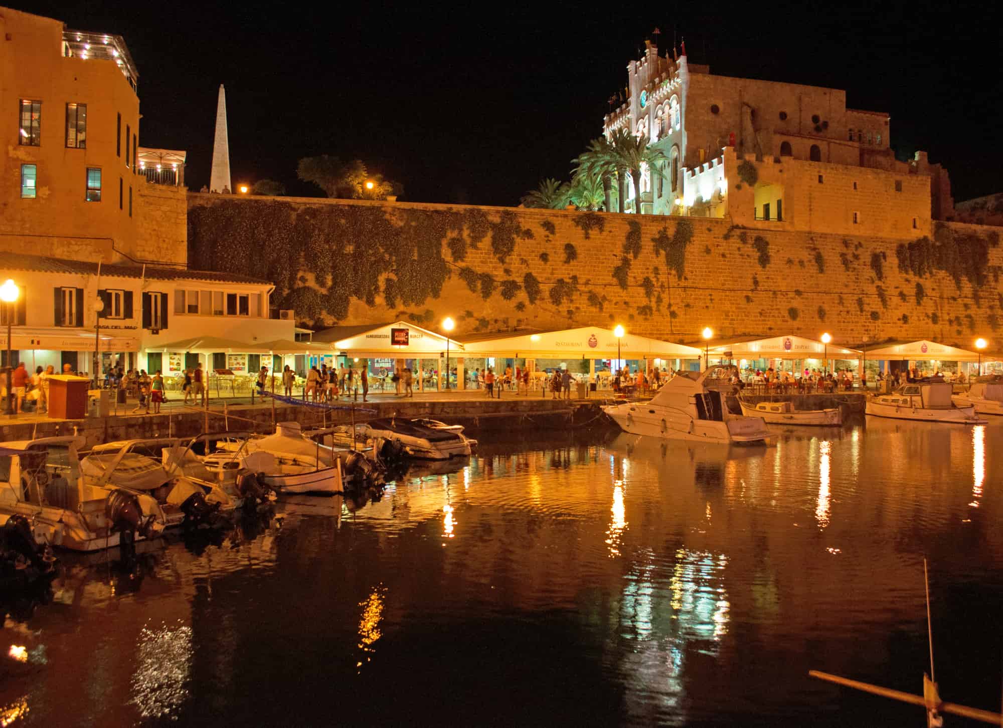 Spain night skyline of the old port and the city walls of Ciutadella, Ciutadella de Menorca