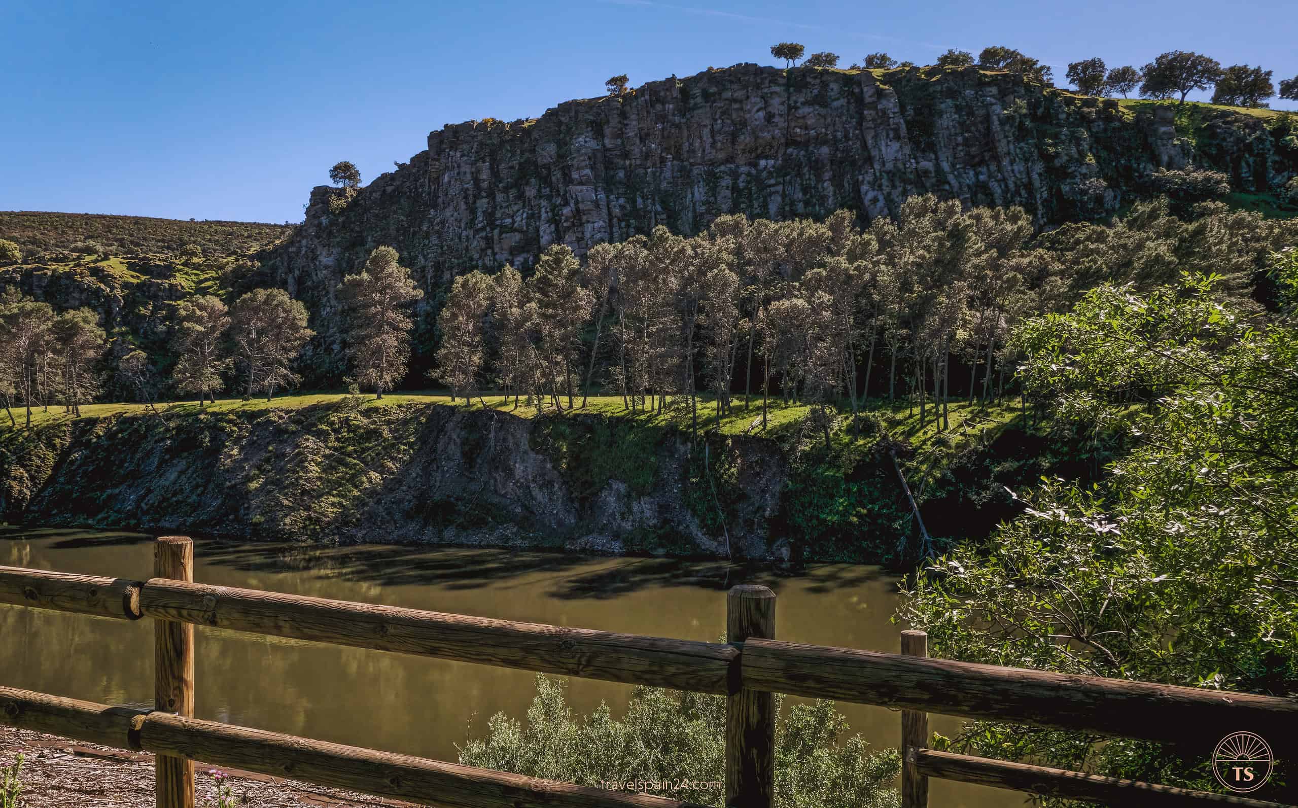 Scenic view from Mirador de la Tajadilla in Monfragüe National Park, showcasing an impressive rock formation and expansive landscape views.