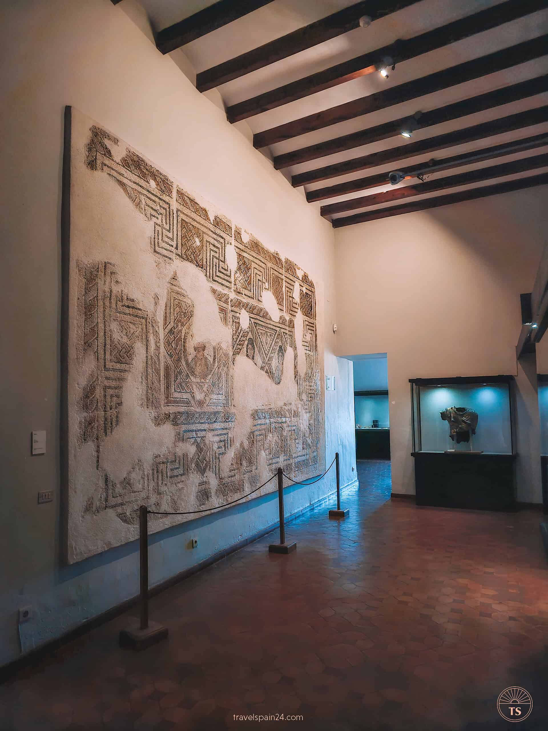 Exhibits inside the Caceres Museum displaying the rich history and culture of Cáceres, providing insights into the city's heritage