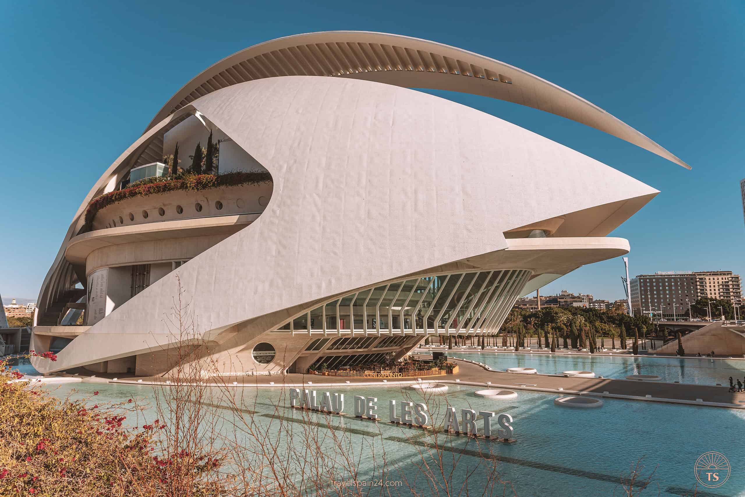 The striking architecture of Palau de les Arts, part of the City of Arts and Sciences in Valencia, serving as an IMAX theater and opera house, underlining its status as a must-see for visitors.