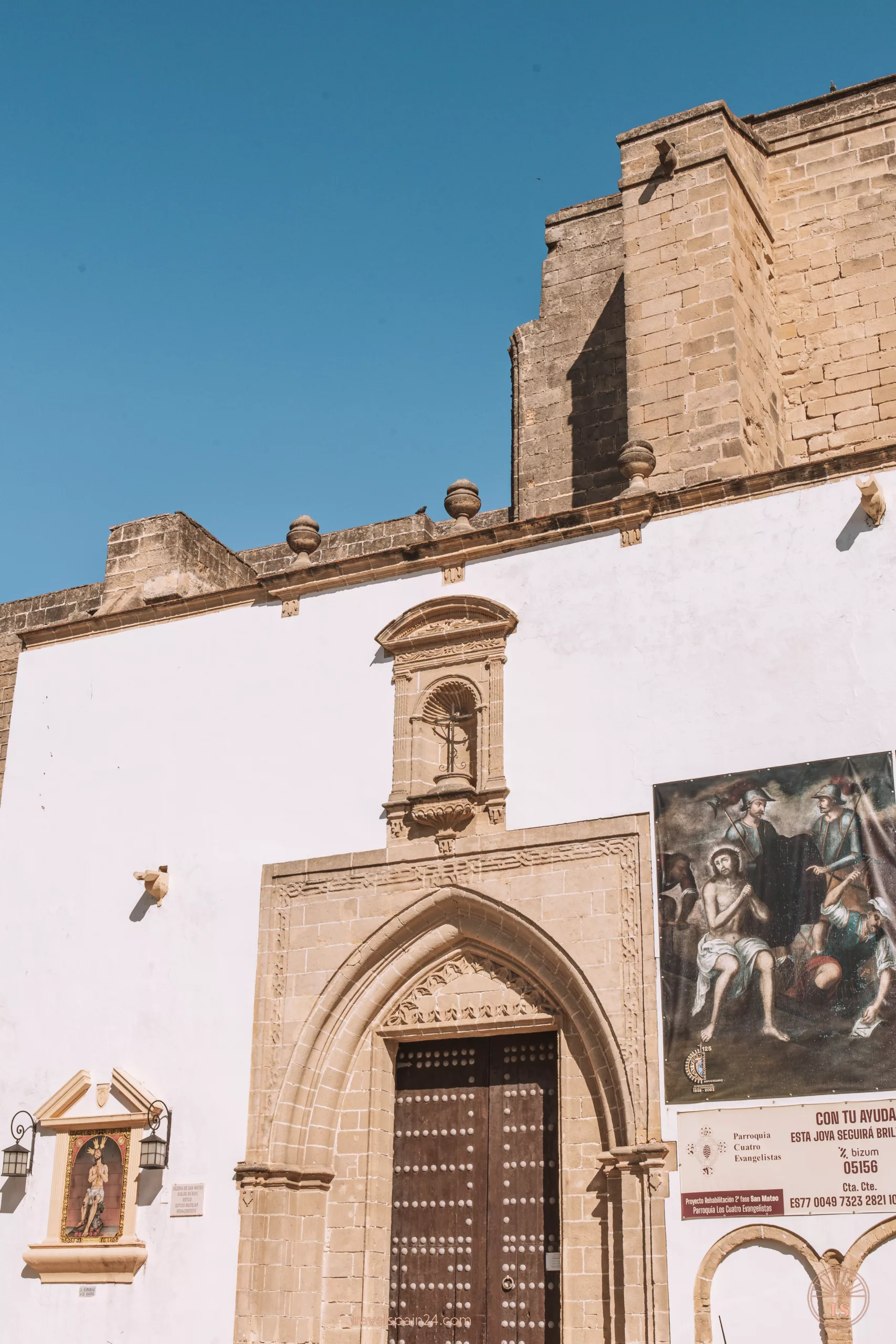 Entrance to Iglesia de San Mateo in Jerez de la Frontera, featuring the intricate doorway. This image relates to the post by showing one of the notable churches to visit in Jerez de la Frontera.