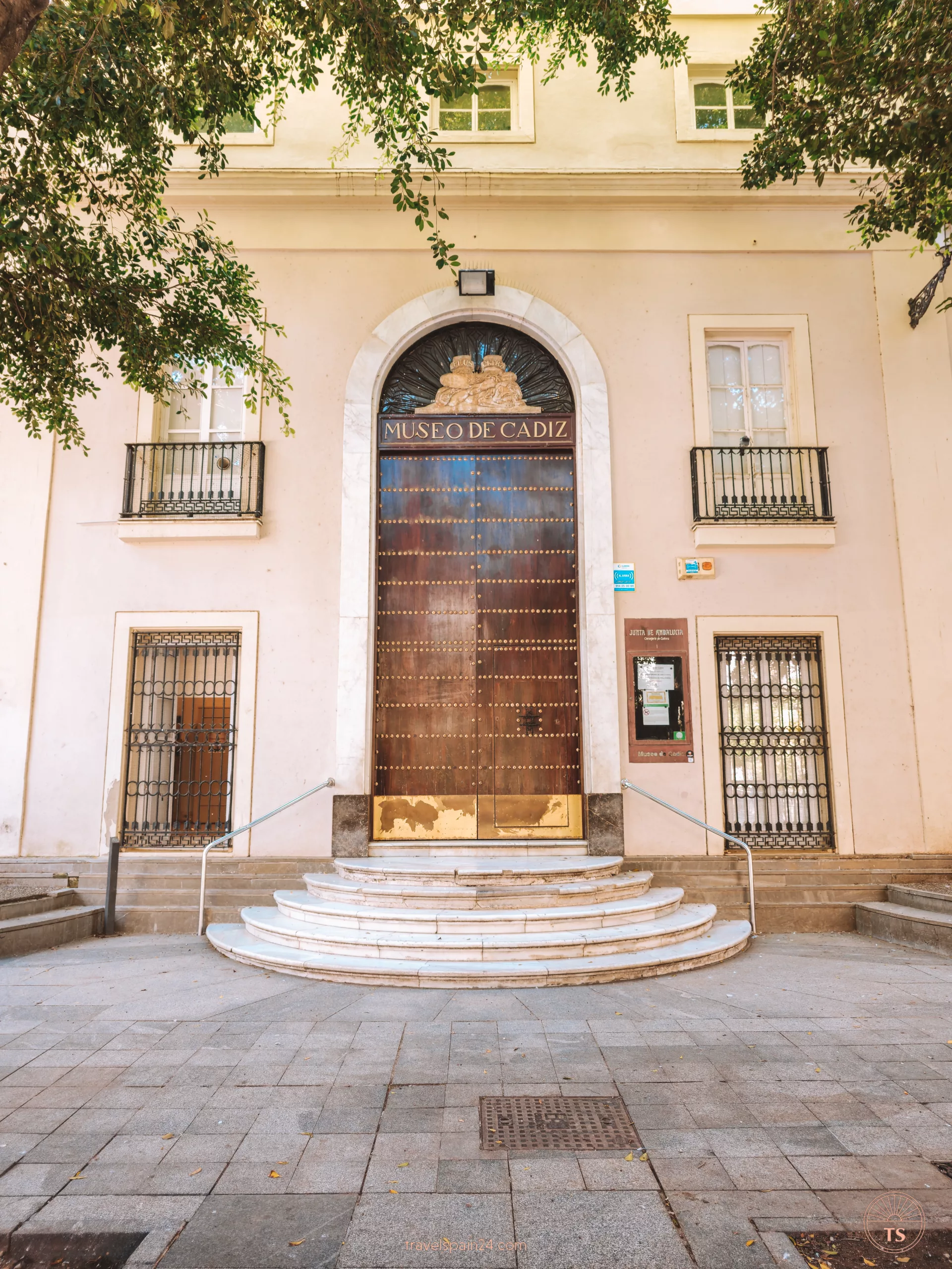 View of the majestic entrance and staircase of the Cadiz Museum. This image offers a glimpse into the cultural richness of Cadiz, a featured stop on the one-day itinerary for exploring the city's highlights.
