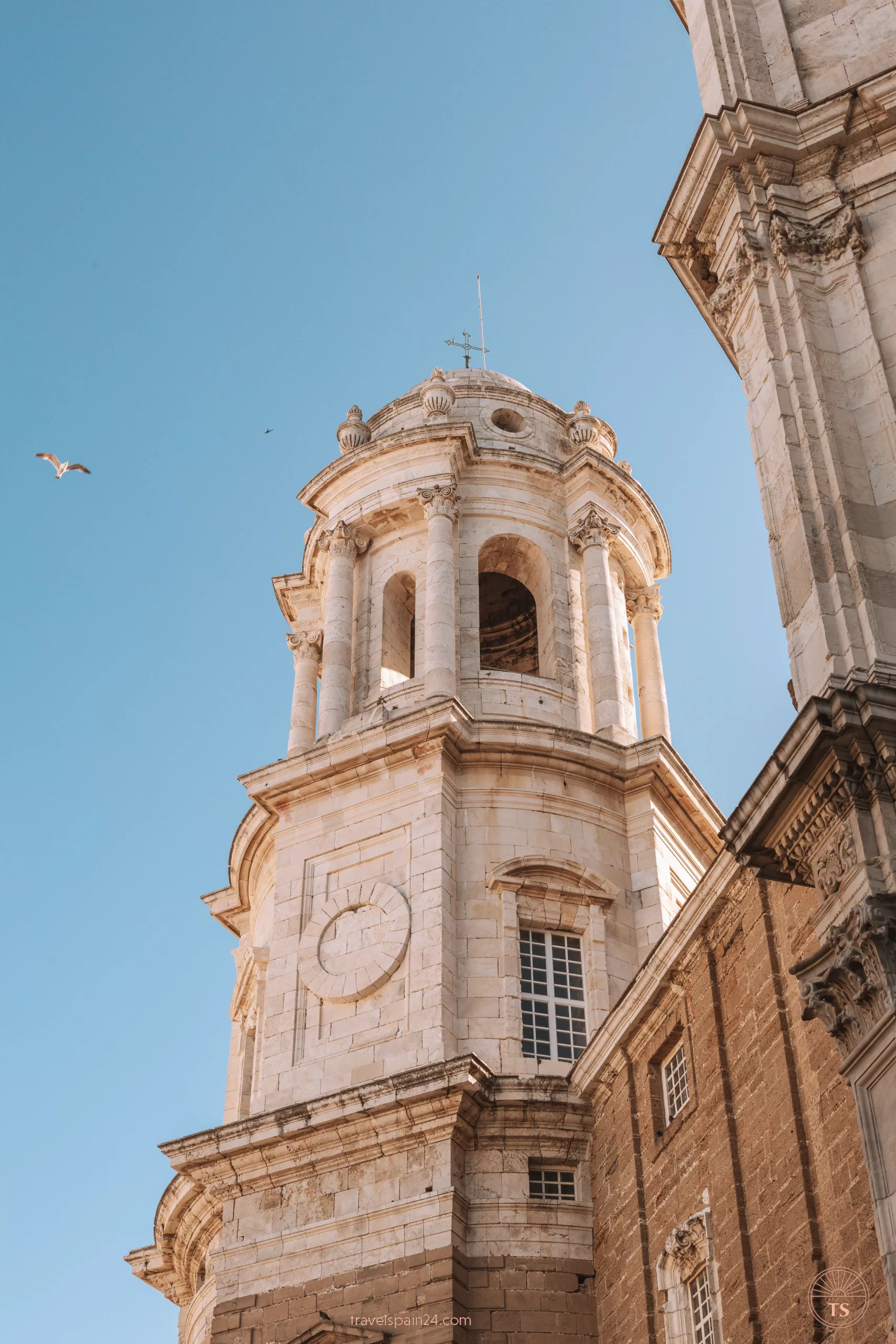 Close-up of one of the towers of Cádiz Cathedral, emphasizing the architectural details as part of the Cádiz one-day itinerary